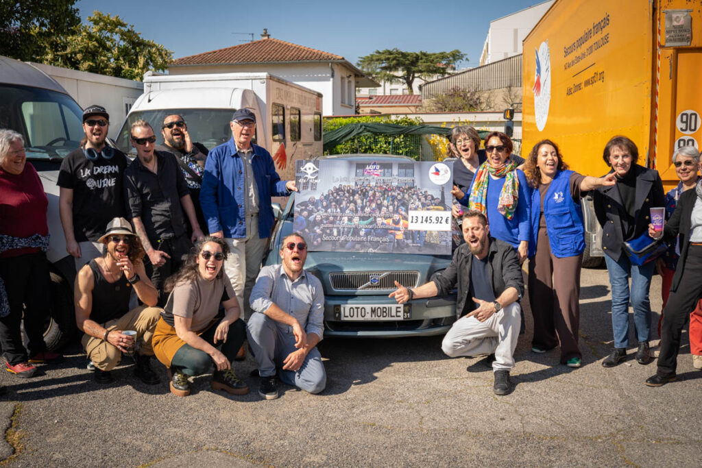 Remise de chèque au Secours Populaire suite au Loto Tekno #5 2026